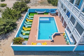 Outdoor pool, a heated pool - Premier Oceanfront Dog Friendly with Pool, Hot Tub, Elevator, Theater, Tiki Bar (Salvo)