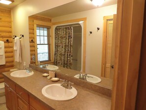 Combined shower/tub, hair dryer, towels, soap