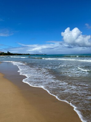 On the beach, sun loungers, beach towels