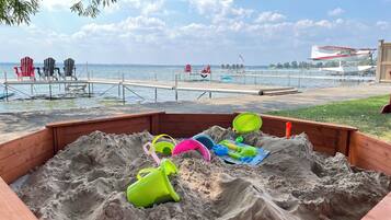 On the beach, sun-loungers, beach towels