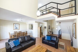 Flat-screen TV, DVD player, books