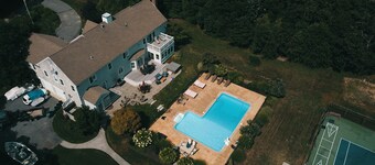 Luxurious 7BR Estate Includes - Tennis Crt, Pool, Hot Tub, Home Theater, & Gym!