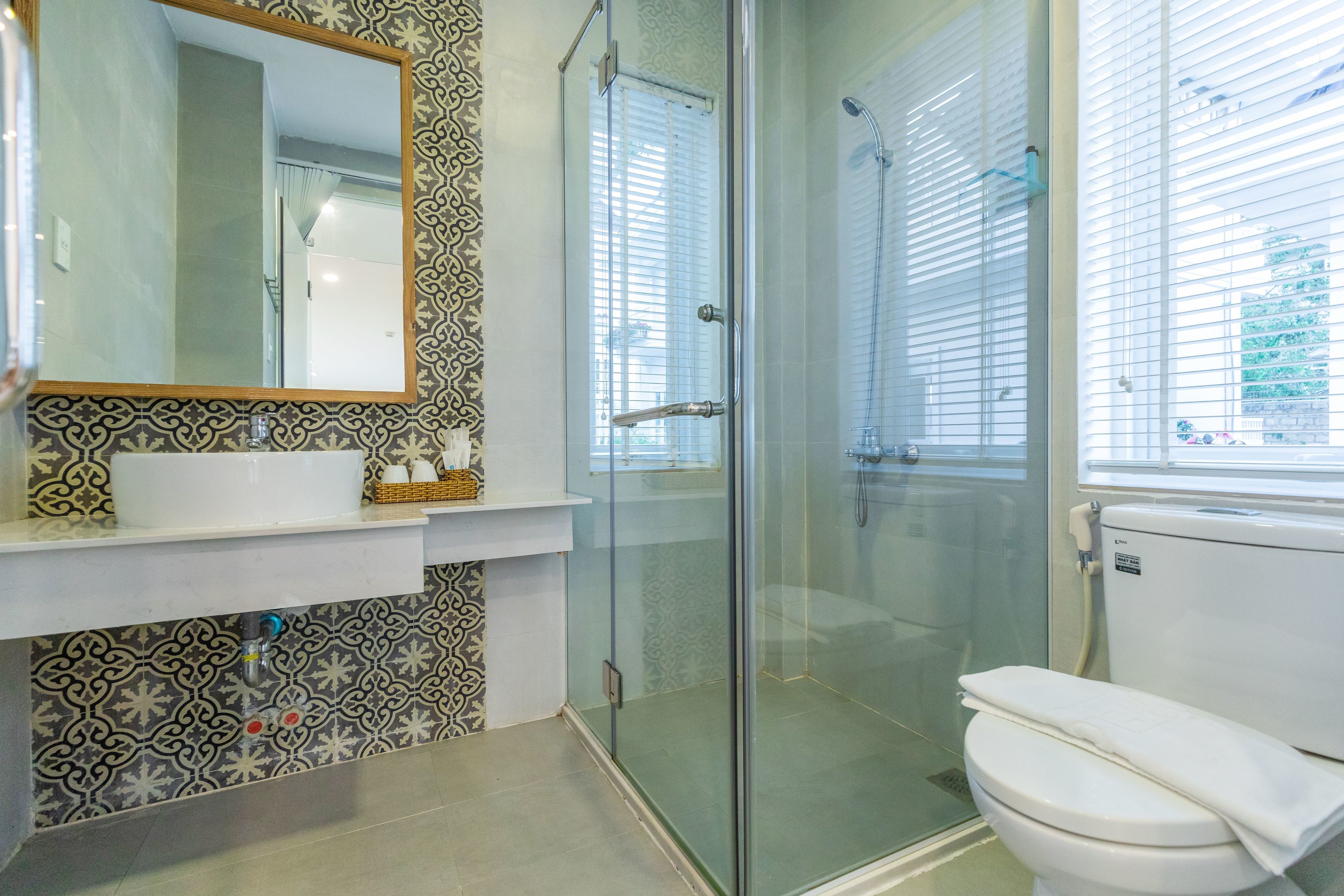 superior triple room | bathroom | shower, free toiletries, hair dryer, slippers