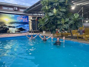 Seasonal outdoor pool, pool loungers