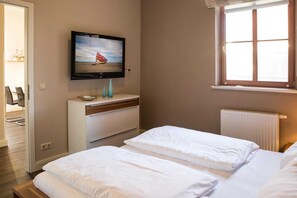 1 quarto, berço de viagem, Wi-Fi, roupa de cama