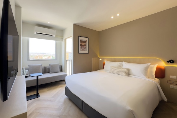 Superior King Room Only | Laptop workspace, blackout drapes, free WiFi