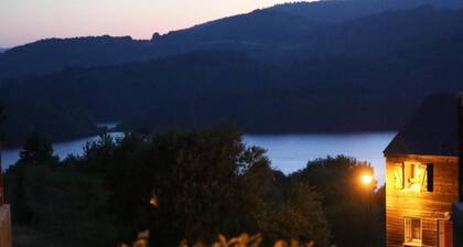 Holiday rental with pool and views of Lake Raviège