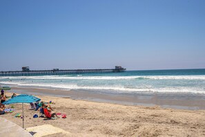 Guests can enjoy a serene beach experience with access to the ocean.
