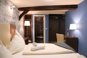 Ropa de cama de alta calidad y minibar