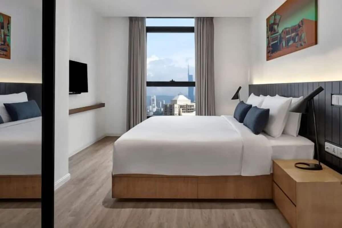 Premium bedding, pillow-top beds, in-room safe, desk