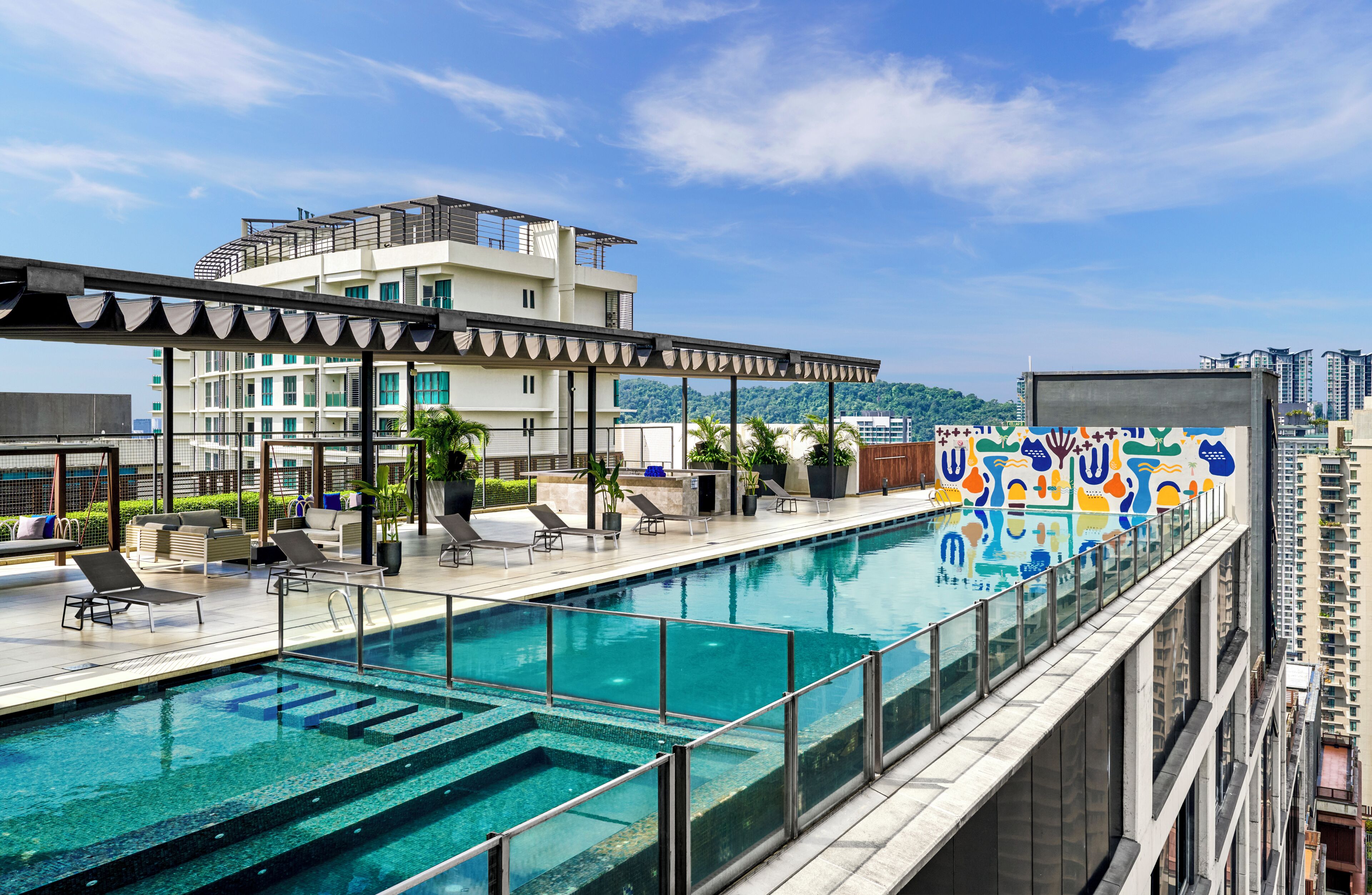 Outdoor pool, open 8:00 AM to 10:00 PM, pool loungers