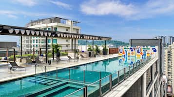 Outdoor pool, open 8:00 AM to 10:00 PM, pool loungers