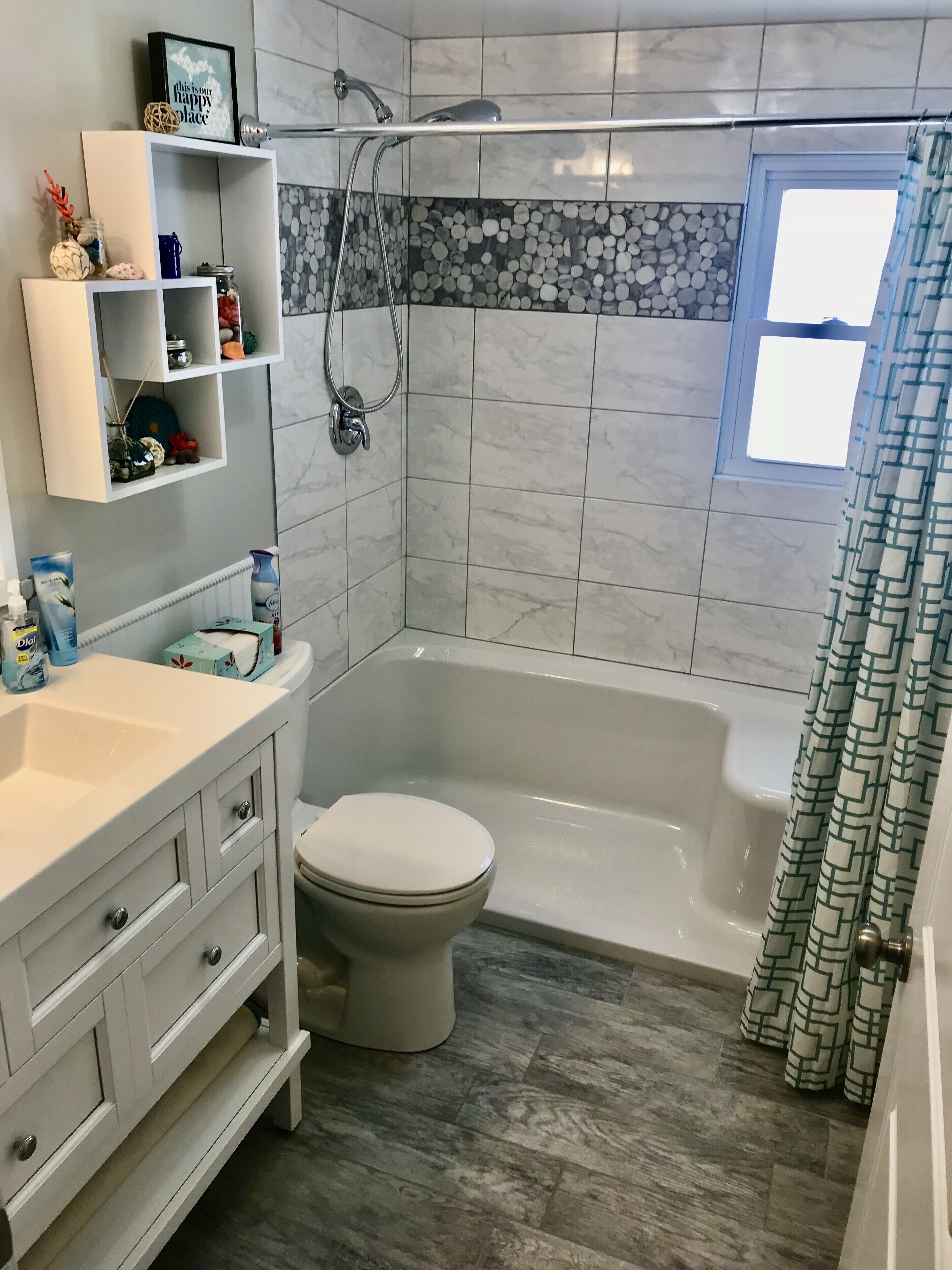 Shower, hair dryer, towels, toilet paper