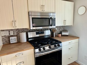 Fridge, microwave, oven, stovetop - 2024 Remodeled Creekside Cabin Steps to Downtown Manitou Springs Lic#9244






 (Manitou Springs)