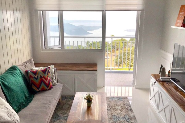 Wake up to the stunning views of Taal Lake