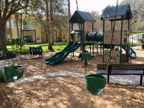 Children can play on the slide, swing set, and in the playhouse.