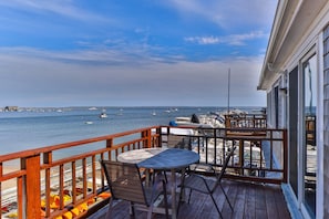 Outdoor dining - Vibrant 4bd Waterfront Boatyard Apartment! Beach access just steps away! (Provincetown)