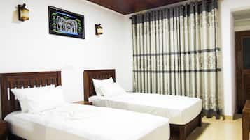 Deluxe Double Room, 2 Bedrooms, Garden View | 2 bedrooms, desk, iron/ironing board, free WiFi