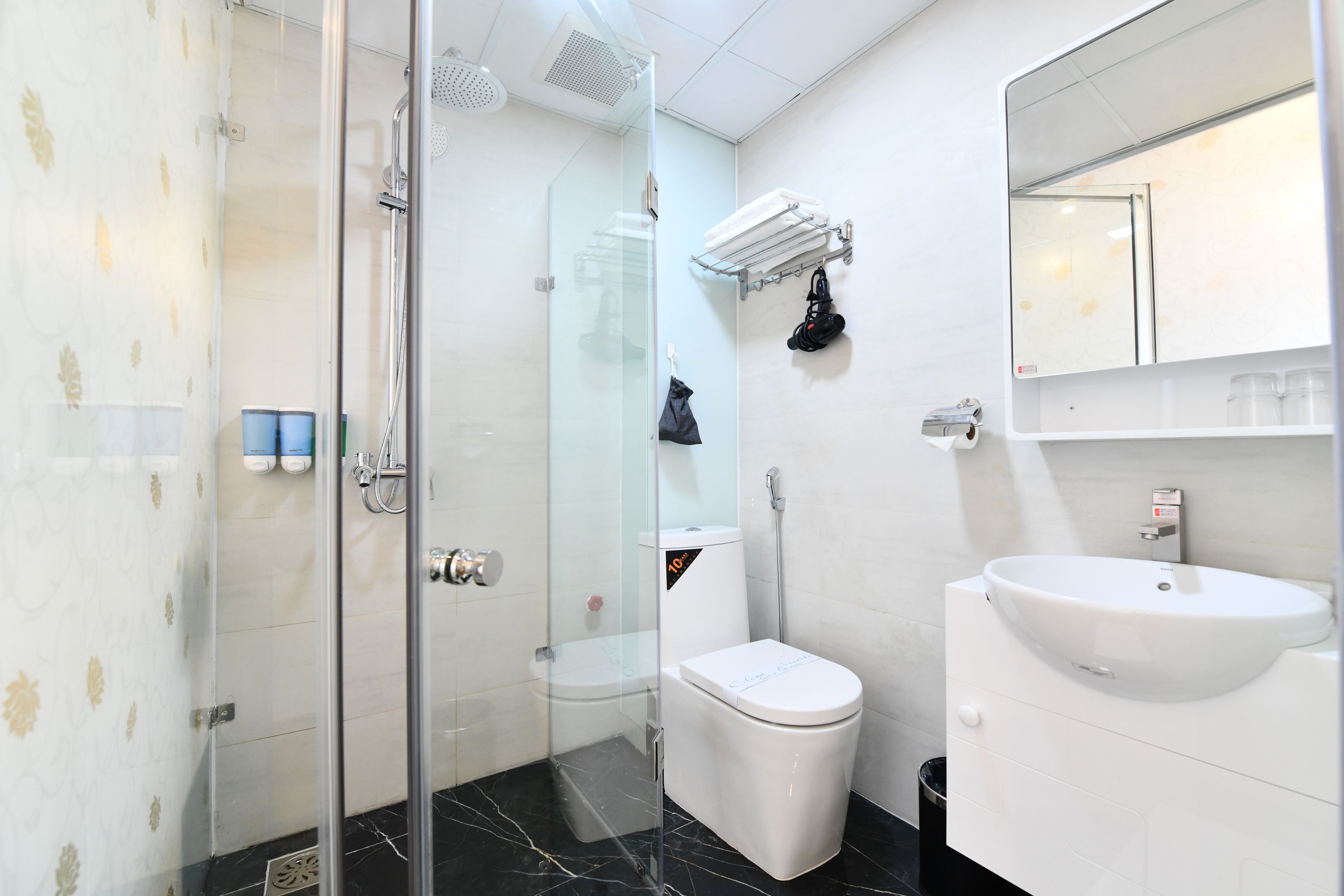 free toiletries, hair dryer, slippers, bidet