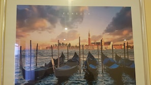 Fotografia amb marc del Gran Canal de Venècia, amb gondoles i edificis històrics.