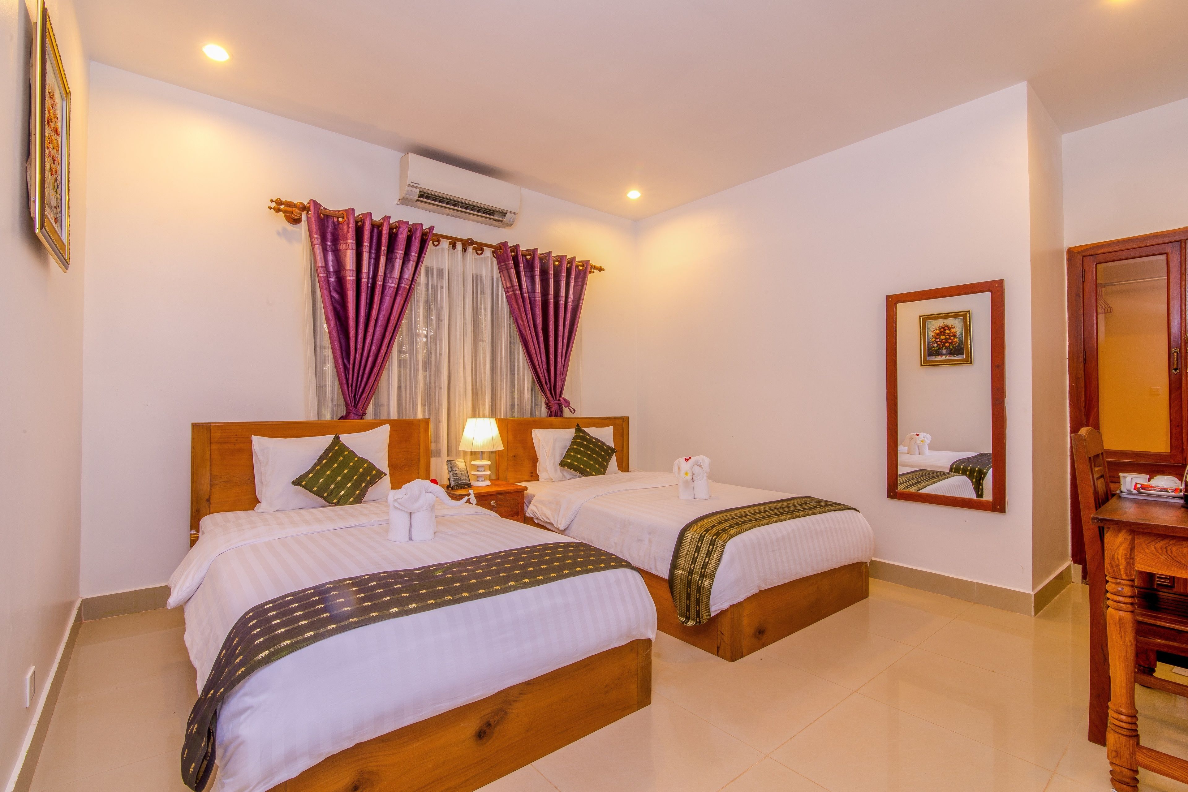 standard twin room | egyptian cotton sheets, premium bedding, down duvets, pillow-top beds