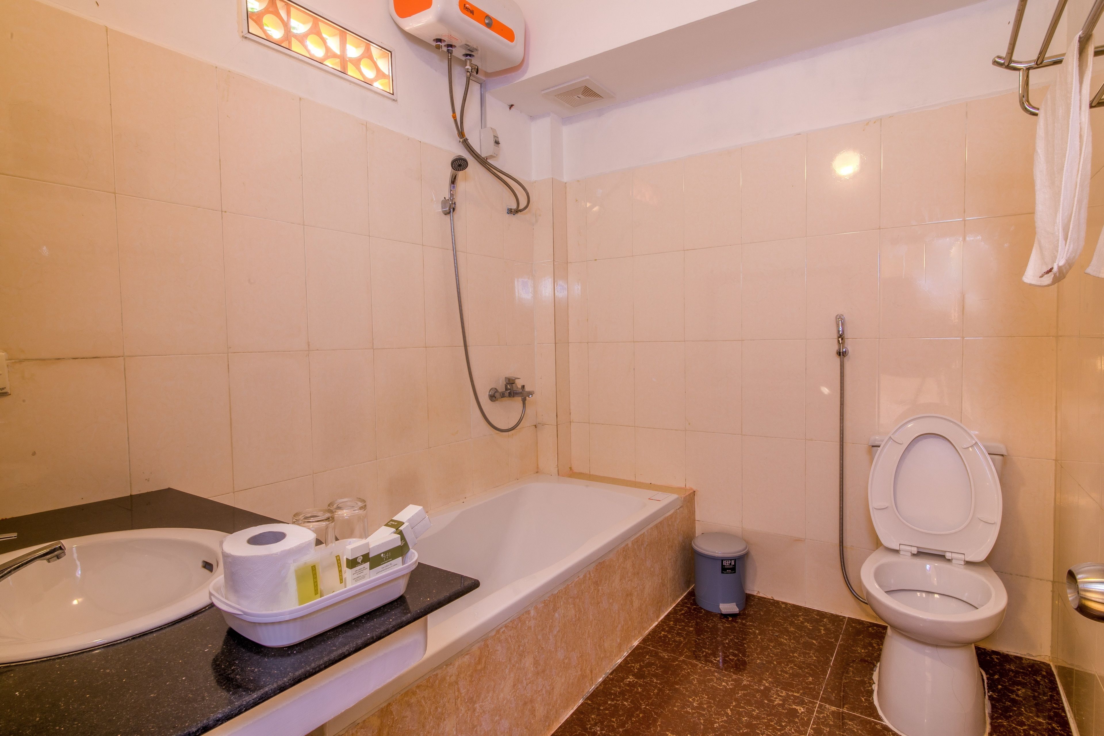 hydromassage showerhead, designer toiletries, hair dryer, slippers