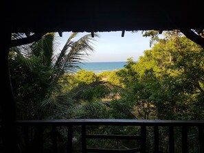 Traditional Tree House, Balcony, Ocean View | In-room safe, bed sheets - Hilltop Cabanas (Komari)