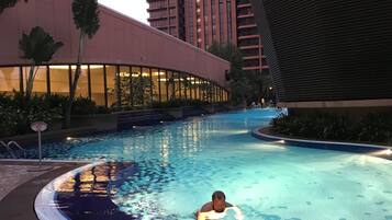 3 outdoor pools, open 7:00 AM to 10:00 PM, pool umbrellas