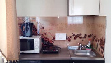 Studio Classique | Cuisine privée | Réfrigérateur, micro-ondes, four, plaque de cuisson