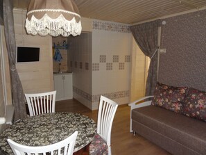 Quarto quádruplo família, 2 quartos, cozinha americana | Sala de estar | TV de tela plana