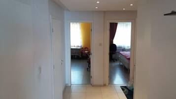 Apartment, 2 Bedrooms, Sea View | Living area | Flat-screen TV