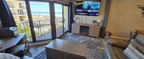 Smart TV, fireplace, DVD player, books