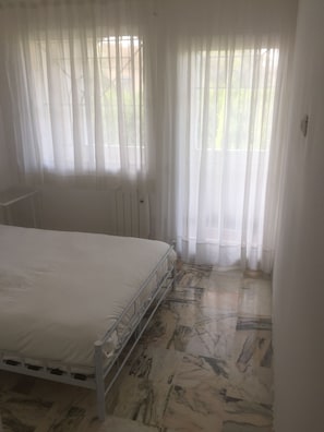 Blackout drapes, soundproofing, iron/ironing board, free WiFi