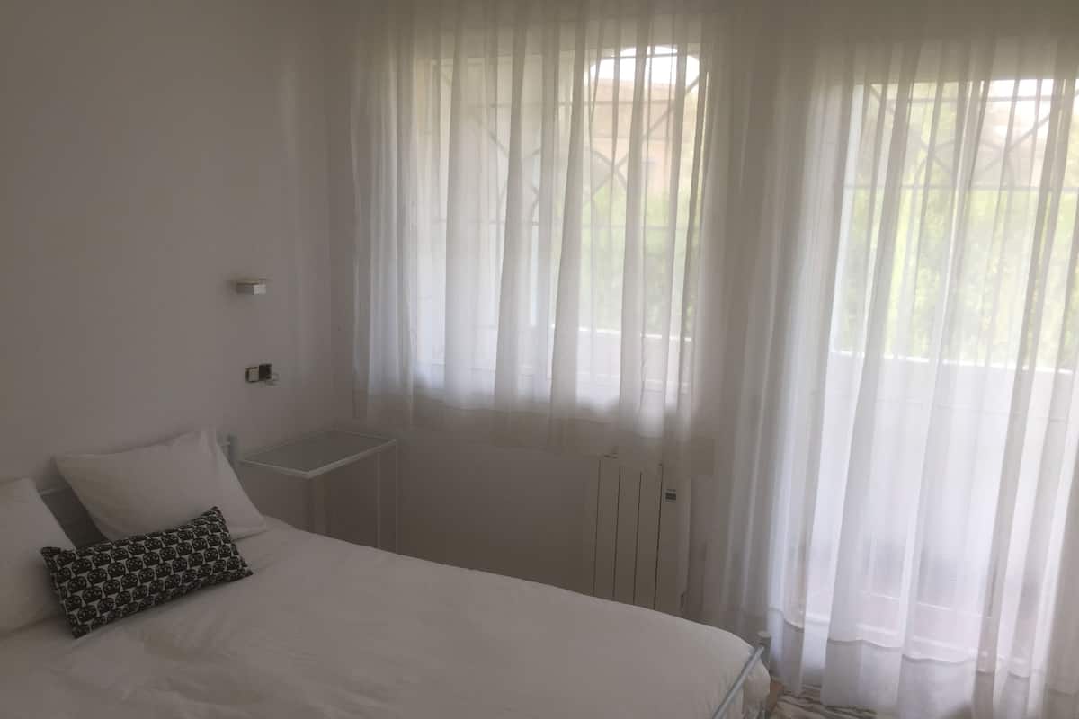 Blackout drapes, soundproofing, iron/ironing board, free WiFi