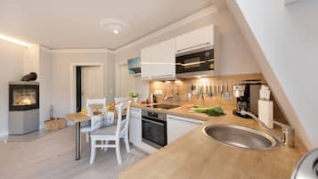 Villa Beach View 6, 2 bedrooms, fireplace, oceanfront, sauna | Private kitchen | Fridge, microwave, oven, stovetop
