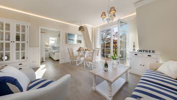 Flachbildfernseher, Kamin, Fußbodenheizung