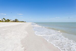 On the beach, sun-loungers, beach towels