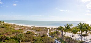On the beach, sun-loungers, beach towels