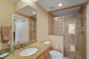 Shower, hair dryer, towels, soap