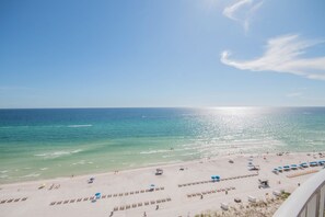 On the beach, sun-loungers