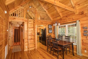 Dining room with loft above