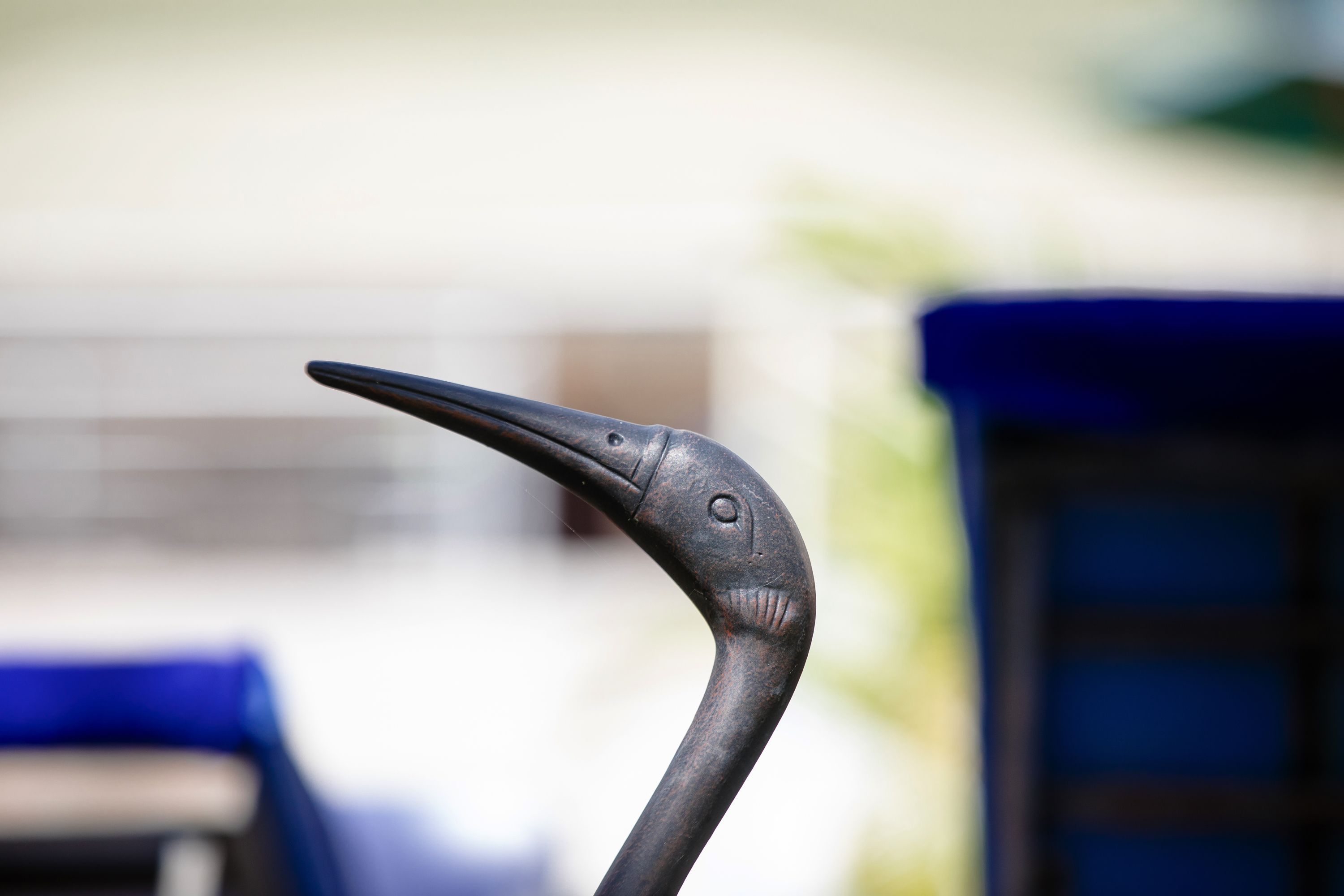 A close-up of a curved metal structure, possibly part of a piece of furniture or equipment.
