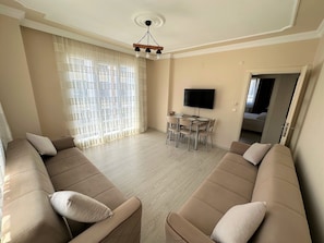 Premium Apartment, Garden View | Living area