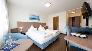 Zimmersafe, Schreibtisch, VerdunkelungsvorhÀnge, schallisolierte Zimmer