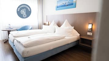 Habitación superior con 1 cama doble o 2 individuales | Caja fuerte, escritorio, cortinas opacas y sistema de insonorización