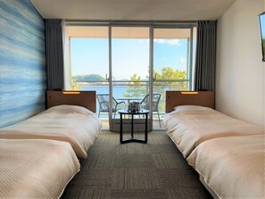 Family Room | Down duvets, bed sheets - Hotel Sea Paradise Inn (Yokohama)