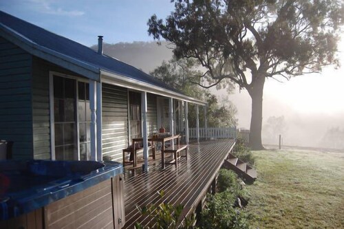 •	“Romantic Countryside Escape – Cozy Hot Tub & Scenic Views”