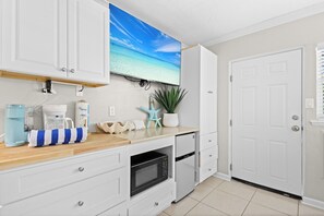 Fridge, microwave, coffee/tea maker, toaster