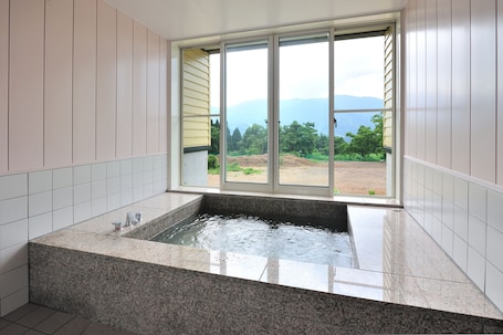 Indoor spa tub. Lodge B&W