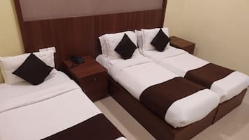Deluxe Triple Room, 1 Bedroom, City View | 1 bedroom, Egyptian cotton sheets, premium bedding, down comforters
